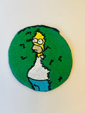 Homer in the shrubs iron-on embroidered patch